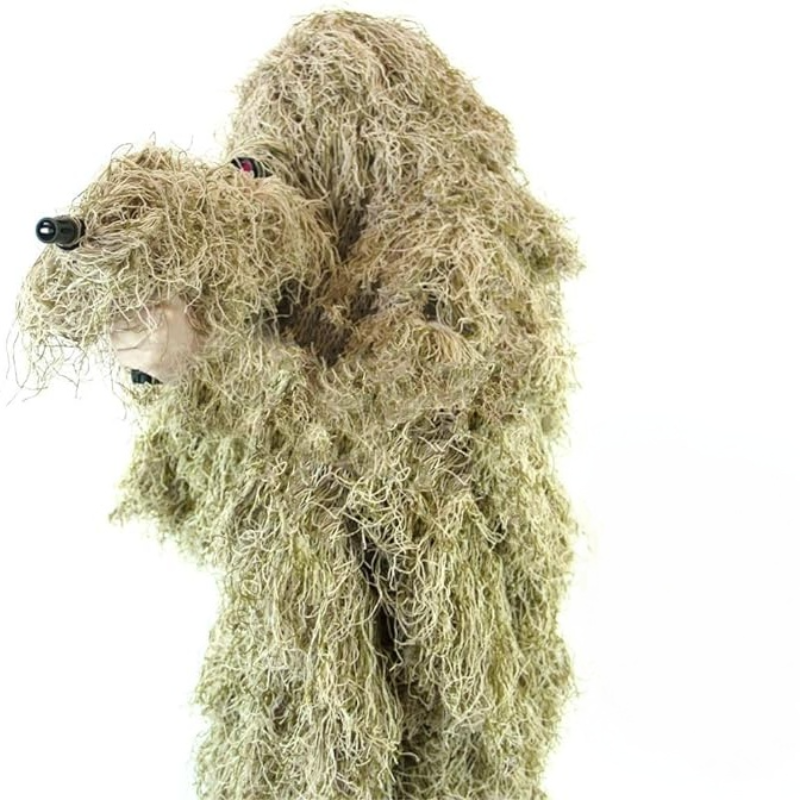 Side view of the Ghost Ghillie Suit in Dry Grass variant, displaying the tan thread base with light olive accents calibrated for open grasslands and fields.