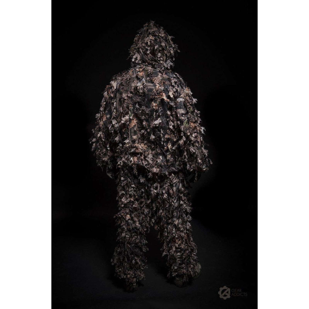 Full-body back view of adult wearing GhillieLabs Woodland Brown 3D leafy suit with attached hood