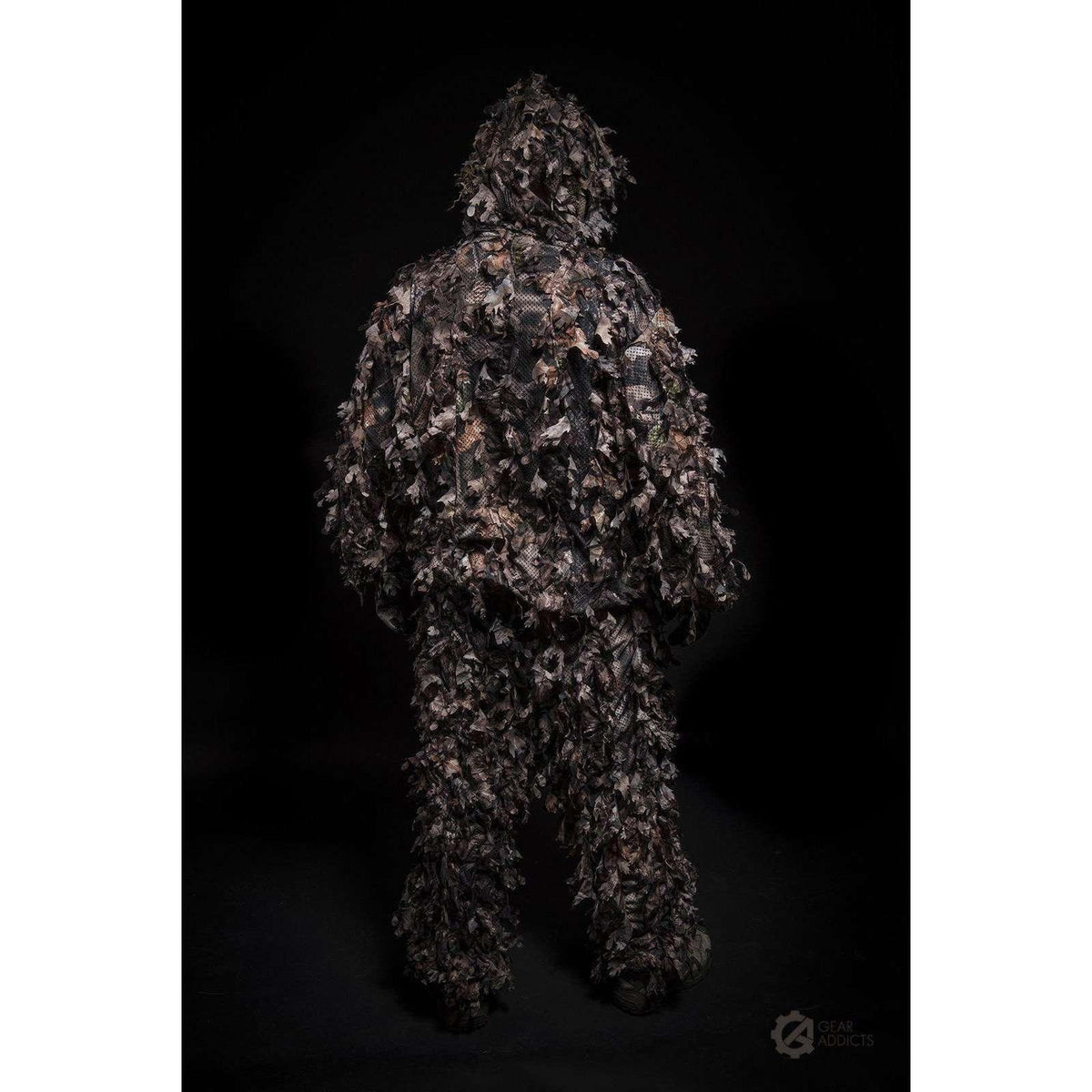 Full-body back view of adult wearing GhillieLabs Woodland Brown 3D leafy suit with attached hood