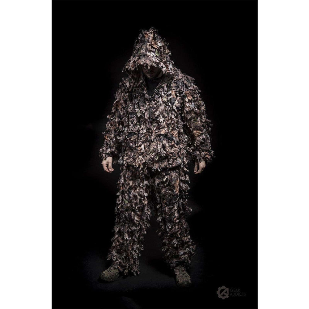 Adult wearing GhillieLabs Woodland Brown 3D leafy suit designed for bird watching and nature research