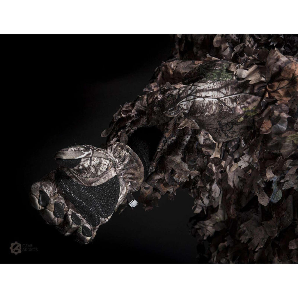 Easy-access zippered front pocket on GhillieLabs leafy suit for retrieving camera accessories in the field