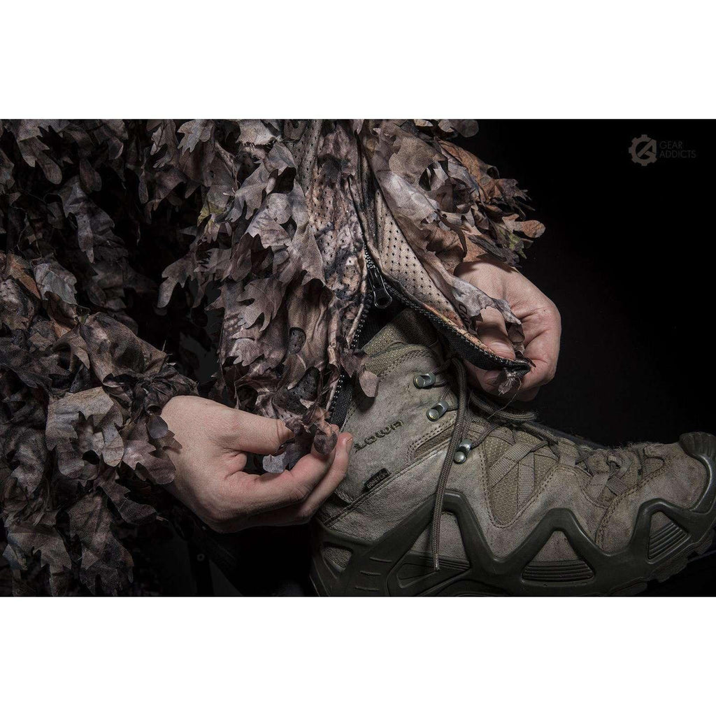 Deep zippered slash pocket on GhillieLabs 3D leafy suit keeping telephoto lens caps and field equipment secure