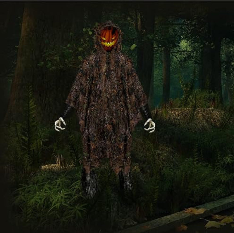 Full head-and-shoulder silhouette break demonstrated by an observer wearing the noiseless, quick-drying polyester mesh camo poncho in dim forest environments.
