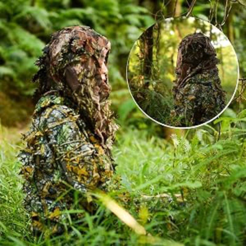 A birdwatcher crouching in a meadow, utilizing the noiseless synthetic polyester leaves that rustle like real foliage to avoid startling sensitive wildlife.