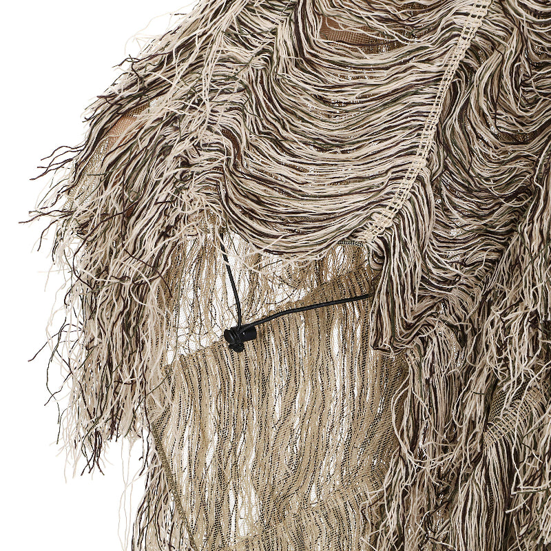 Close-up of the dynamic quick-snap buttons and adjustable side tension cords on the Ghost Ghillie Poncho
